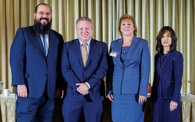 Rabbi Shalom Lubin, left, with Warren Usatine, Christine Amalfe, and Hon. Rachel Freier.Courtesy Rabbinical  (College of America)