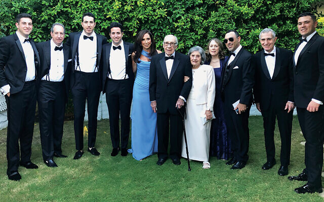 Most of the family gathers for a wedding; from left, Will, Marc, Alex, Drew, and Amy Rosenberg; Robert and Vivienne Cohen; Jody Cohen-Gavarian; Amitai and Jimmy Gavarian, and Brody Cohen.