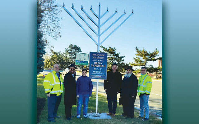 About 200,000 people every day see this menorah at the entrance to Newark Liberty International Airport.
