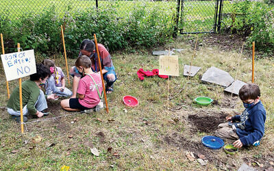 Kindergarteners at Temple Sharey Tefilo-Israel in South Orange, inspired by the bottle Milo Dorfman found, learn archaeology. (Photos courtesy Temple Sharey Tefilo-Israel)
