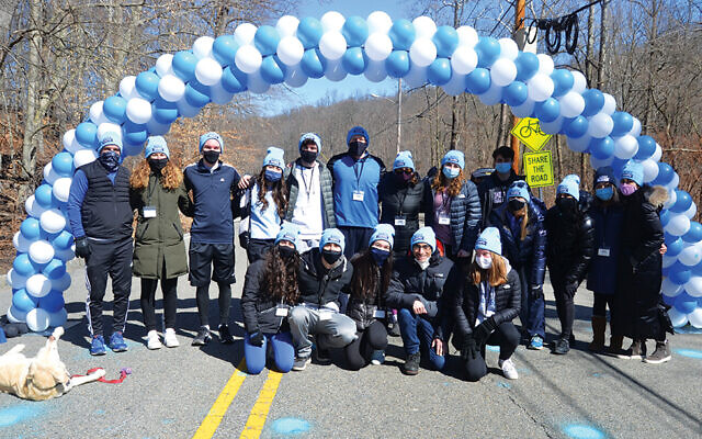 Last year, volunteers joined the Dranikoff family of Millburn for March Fourth. This year’s run is set for March 6.