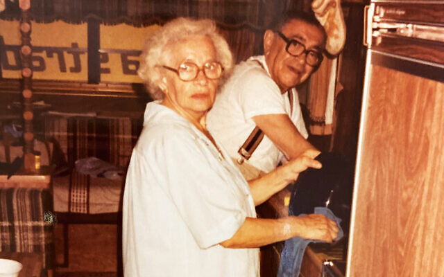 Esther and Dr. Meyer Bieler stand in the trailer’s small kitchen.