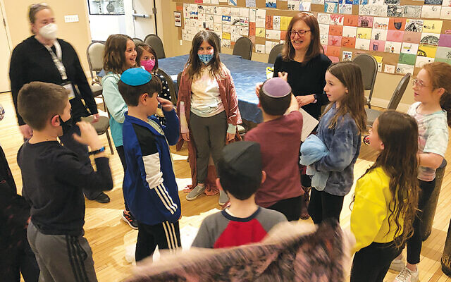 Cantor Janet Roth, center, teaches Torah in Motion.