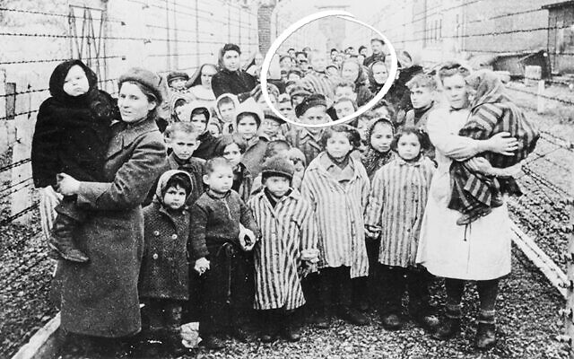 In 1945, a Soviet soldier took his picture of liberated children leaving Auschwitz; circled in the center, Michael’s grandmother carries him to freedom. (Both Photos: United States Holocaust Memorial Museum, courtesy of National Archives and Records Administration, College Park)