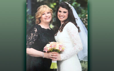 Esther and her daughter, Elana, stand together at Elana’s wedding.