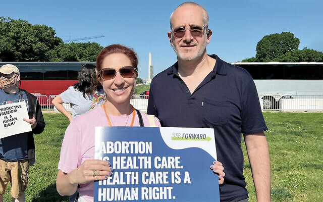 Rabbi Daniel Cohen of Temple Temple Sharey Tefilo-Israel in South Orange and the incoming president of the National Council of Jewish Women, Jennie Rothman, stand together in Washington at a rally protesting the likely overturning of Roe v. Wade. (Rabbi Daniel Cohen)