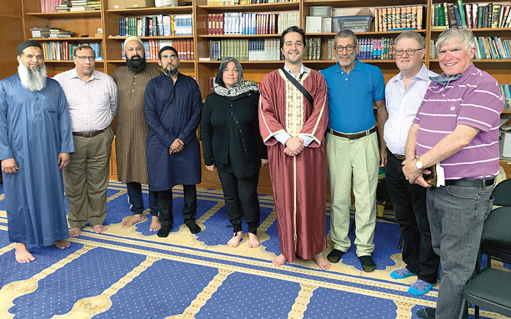 Jews and Muslims are together at the Nida-ul-Islam mosque. Joseph Kaplan is at the far right.