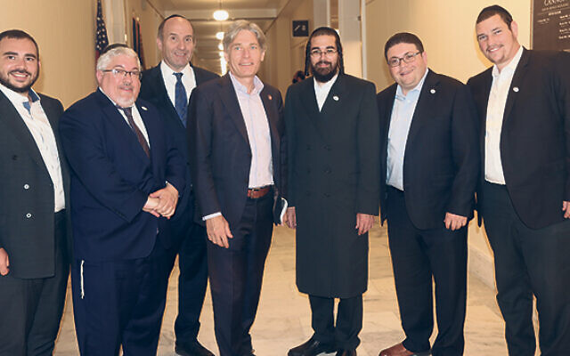 Shabsie Levy, Josh Pruzansky, Morris Helfgott, Representative Tom Malinowski (D-NJ Dist. 7), David Rosenberg, Emanuel Klein, and Joey Friedman. (Courtesy NJJBA)