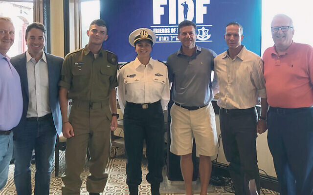 Wayne Kent, left, with Rob Fink, Staff Sergeant Rom, Captain Ofir, 
Mitch Broder, Major General Nadav Padan, and Howard Gases (Courtesy of FIDF)