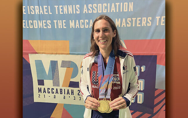 Danielle Schwartz Auerbach displays the two gold medals she won at the Maccabiah.