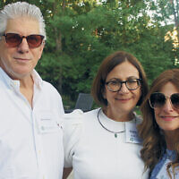 Mark and Robin Polson of Maplewood, left, and  JFS board chair Andrea G. Bier of West Orange