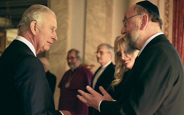 King Charles III meets Chief Rabbi Ephraim Mirvis during a September reception at Buckingham Palace. (Aaron Chown/Pool/AFP via Getty Images)