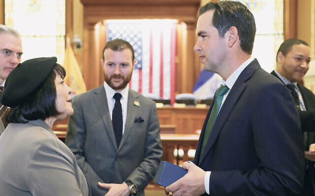 From left, Beit Shemesh’s Mayor Aliza Bloch, New Jersey-Israel Commission Executive Director Andrew Gross, and Jersey City Mayor Steve Fulop talk. Jasaun Boone, chief of staff to New Jersey’s Secretary of State Tahesha Way, is behind Mayor Fulop. (Courtesy of New Jersey-Israel Commission)