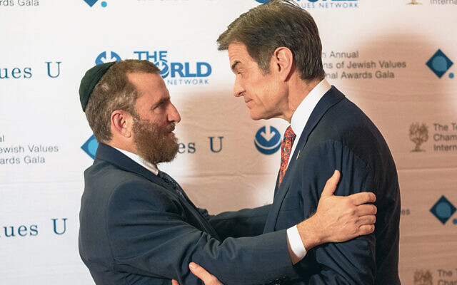 Rabbi Shmuley Boteach and Dr. Mehmet Oz meet at the 2022 Champions of Jewish Values gala at Carnegie Hall in Manhattan on Jan. 20, 2022. (Alexi Rosenfeld/Getty Images)