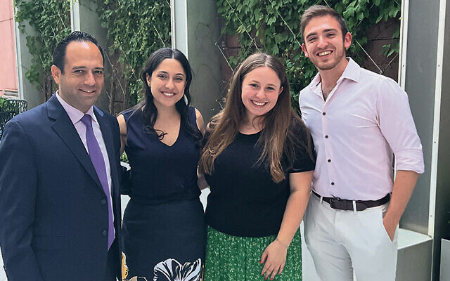 Michael Cohen of Englewood, at left, the director of the Simon Wiesenthal Center’s Eastern region, stand with three graduates of the center’s government advocacy internship program; from the left, they are Isabelle De Brabanter, Serena Bane, and Ezra Dayanim. (Simon Wiesenthal Center)