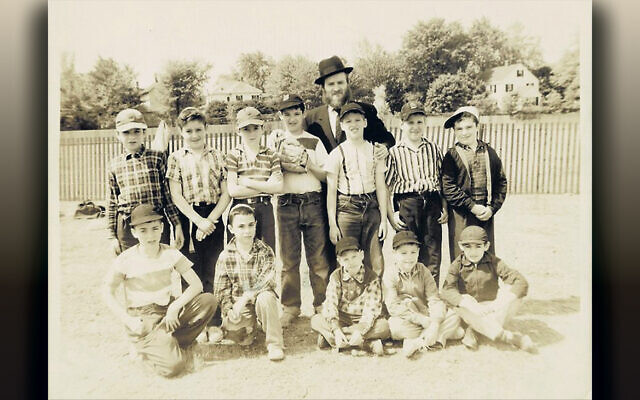 Rabbi Gordon as a younger man with students  in an undated photo, most likely taken when he was a teacher in Connecticut or Massachussets.