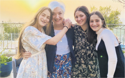 On erev Pesach, just before the sun set over Israel, Tzivia Bieler stands with three of her granddaughters, Tselya, Estair, and Hadar Kwalbrun. On erev Pesach, just before the sun set over Israel, Tzivia Bieler stands with three of her granddaughters, Tselya, Estair, and Hadar Kwalbrun.