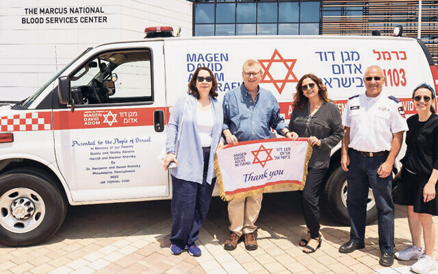 Susan and Dr. Benjamin Krevksy, left, with Alicia Salama, Israel liaison for American Friends of Magen David Adom; Yoni Yagodovsky, director of International Relations for Magen David Adom in Israel; and Alexandra Bernstein, a major gifts director for AFMDA, at Magen David Adom’s Marcus Blood Services Center in Ramla, Israel. (American Friends of Magen David Adom)