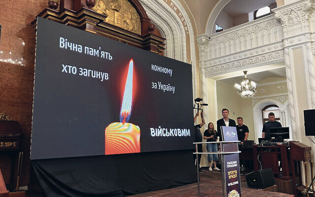 As the war continued, many of the Jews who remain in Kyiv went to the Brodsky Central Synagogue there to celebrate its 125th anniversary. The sign, in Ukrainian, welcomes them. (Courtesy Chief Rabbi of Ukraine)