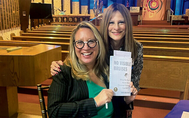 Author Rachel Louise Snyder and Andrea G. Bier of West Orange, president of the JFS board of trustees. (Courtesy JFS)
