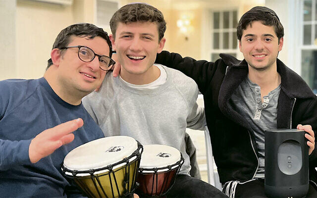 ON THE COVER:  Musician Jack Kasindorf, center, works with Yachad students as the new music studio opens. (New Jersey Yachad)