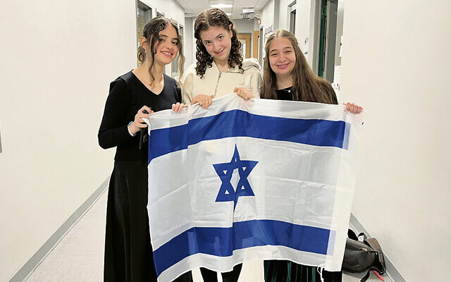 ON THE COVER:  Sinai at Ma’aynot students show their pride in Israel as their teachers explain how the world has changed and help them develop strategies to cope with it. (Sinai Schools)