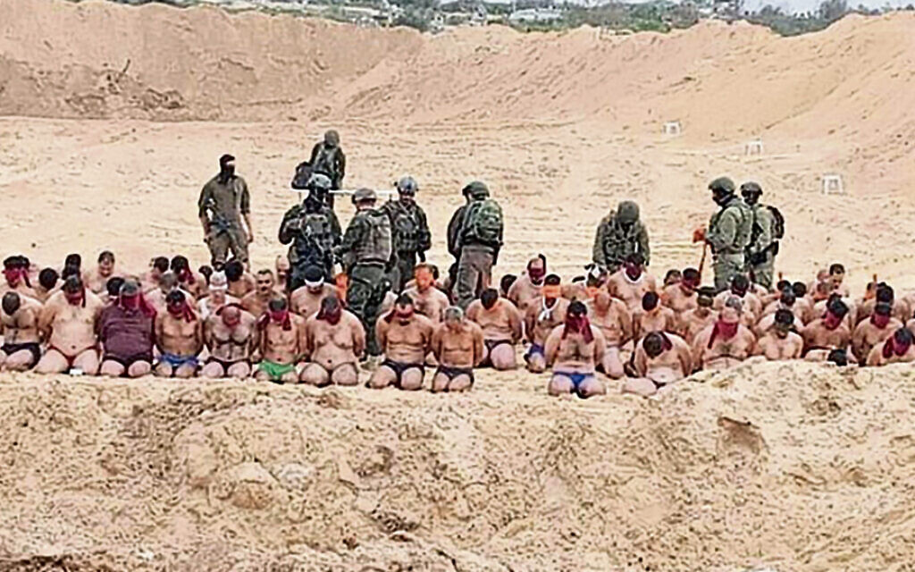 Palestinian men said to have surrendered to the IDF in the Jabaliya area of northern Gaza on December 7, 2023. (Social media: used in accordance with clause 27a of the copyright law)