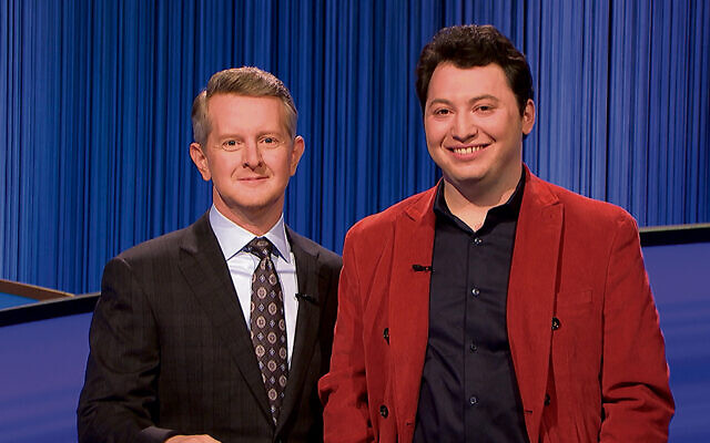 Ittai Sopher, right, stands with “Jeopardy” host — and all-time winner — Ken Jennings