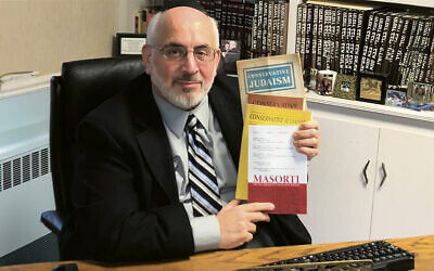 Rabbi Joseph Prouser sits in his study at Temple Emanuel of North Jersey in Franklin Lakes