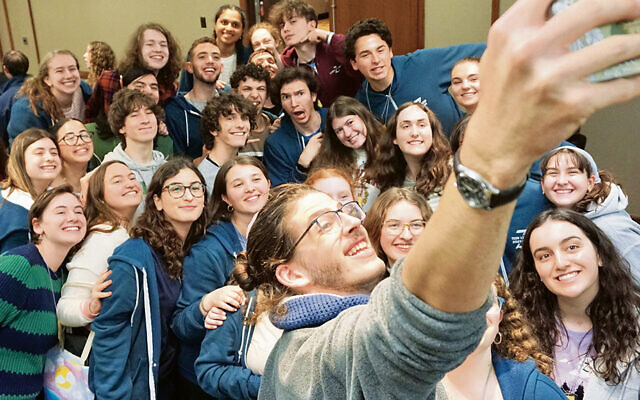 Ilan Penkower takes a selfie with some of his many HaZamir friends  (All photos courtesy Joseph Kaplan)