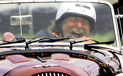 Cantor Mandel drives his beloved Morgan. Cantor Mandel drives his beloved Morgan.