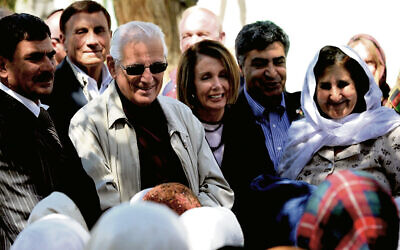 Representatives Bill Pascrell, center, and Nancy Pelosi visit a girls’ school in Afghanistan during a congressional trip on March 20, 2011. (S.K. Vemmer/Department of State)
