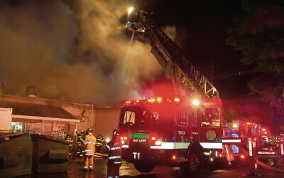 The Fair Lawn fire department fought the flames as the strip mall burned on July 26. (Courtesy of Bill Tompkins)