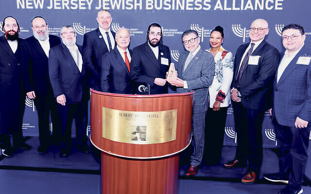 Moshe Schwartz, president of Schwartz Realty; Ari Stahl of Engel Holdings; Nathan Herzog, president of Royal Wine Corp.; Maksim Sheyn, chief banking officer of Alma Bank; Miles Berger, chairman and COO of the Berger Organization; David Rosenberg, executive director of the NJJBA; honoree N.J. State Senator Anthony Bucco; Monica Slater-Stokes, managing director for corporate and government affairs for United Airlines; Avi Kelin, partner at PEM Law; and Emanuel Klein, managing partner at Peek Properties. (Photos courtesy NJJBA) Moshe Schwartz, president of Schwartz Realty; Ari Stahl of Engel Holdings; Nathan Herzog, president of Royal Wine Corp.; Maksim Sheyn, chief banking officer of Alma Bank; Miles Berger, chairman and COO of the Berger Organization; David Rosenberg, executive director of the NJJBA; honoree N.J. State Senator Anthony Bucco; Monica Slater-Stokes, managing director for corporate and government affairs for United Airlines; Avi Kelin, partner at PEM Law; and Emanuel Klein, managing partner at Peek Properties. (Photos courtesy NJJBA)