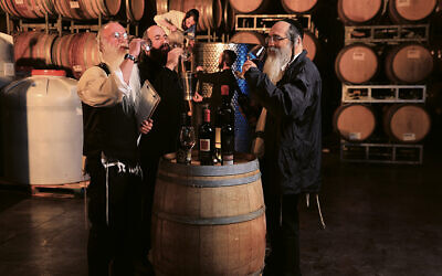 Winemaker Aharon Ziv with Or Haganuz’s winemaking team