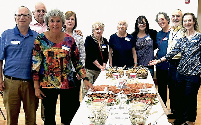 ACES members/volunteers shown here include Max Kleinman, co-chairs Roberta Rabin, Cantor Lorna Wallach, and Art Fredman; Phyllis Elson, Nancy Sloan, Wendy Kaplowitz, Mona Jacobs, Lilli Finkler, Steve Finkler and Amy Dantus and Risa Wasserman are not pictured. (Courtesy CBI) ACES members/volunteers shown here include Max Kleinman, co-chairs Roberta Rabin, Cantor Lorna Wallach, and Art Fredman; Phyllis Elson, Nancy Sloan, Wendy Kaplowitz, Mona Jacobs, Lilli Finkler, Steve Finkler and Amy Dantus and Risa Wasserman are not pictured. (Courtesy CBI)