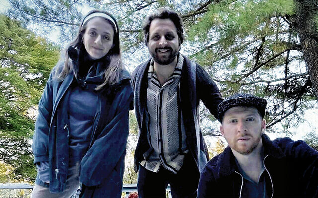 Sarah, Avram, and Elisha Mlotek recorded “Light One Candle” in Yiddish. Sarah, Avram, and Elisha Mlotek recorded “Light One Candle” in Yiddish.