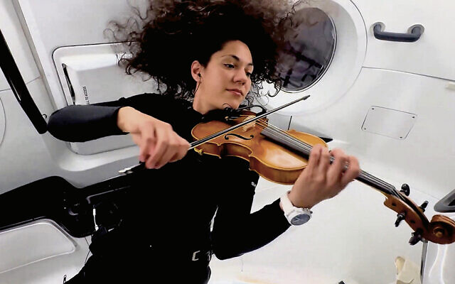 Astronaut Sarah Gillis played her violin in the spacecraft. (Ironbound Films)
