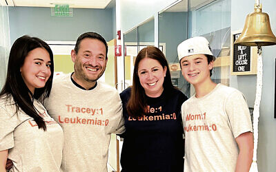 Ashley, Jason, Tracey, and Reid Hoberman celebrate Tracey ringing the bell at Morristown Medical Center after completing her cancer treatment on October 3, 2025. Ashley, Jason, Tracey, and Reid Hoberman celebrate Tracey ringing the bell at Morristown Medical Center after completing her cancer treatment on October 3, 2025.