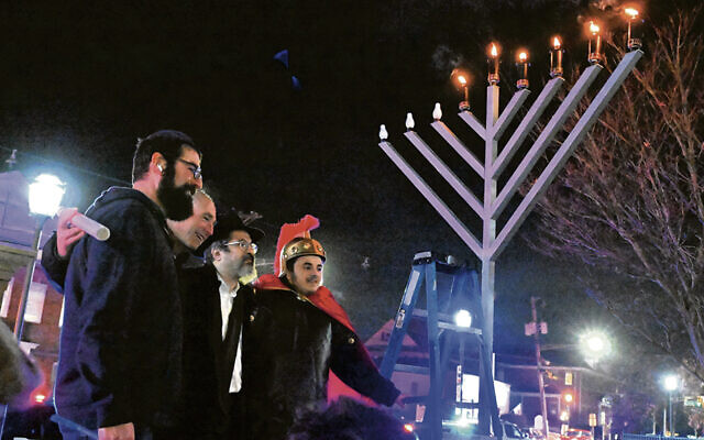 Josh Commer, left, with Livingston Mayor Ed Meinhardt, Rabbi Zalman Grossbaum, CEO of Friendship Circle/LifeTown, and FC’s Rabbi Levi Grossbaum. (Jerry Siskind)
