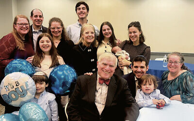 Sharon and Joseph Kaplan are surrounded by their children and grandchildren. (Joseph Kaplan)