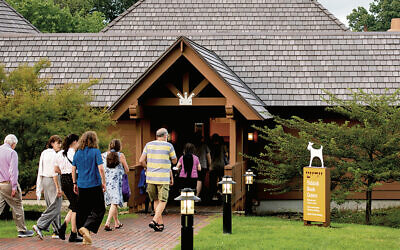 Visitors walk into the Yiddish Book Center in Amherst, Mass.