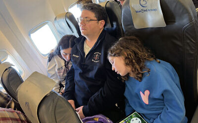 Manny Klein with his daughters, Aliza and Ariella