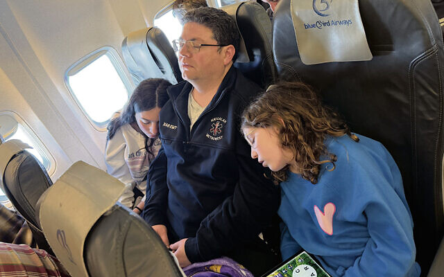 Manny Klein with his daughters, Aliza and Ariella