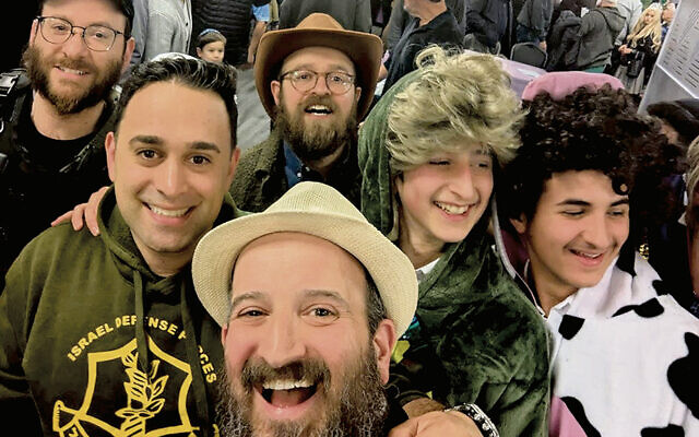 Rabbi Mendy Kasowitz and community members at the Purim celebration at Chabad of West Orange. (Courtesy Chabad of West Orange) Rabbi Mendy Kasowitz and community members at the Purim celebration at Chabad of West Orange. (Courtesy Chabad of West Orange)