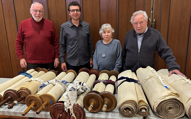 From left: Jeffrey Ohrenstein, chairman of the Memorial Scrolls Trust; Andrew Keene, the trust’s vice president; Naomi Patz. and Rabbi Norman Patz. From left: Jeffrey Ohrenstein, chairman of the Memorial Scrolls Trust; Andrew Keene, the trust’s vice president; Naomi Patz. and Rabbi Norman Patz.