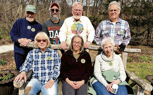Standing, from left: Mike Marcus, Rabbi Uri Allen, Richard Brown, and Roger Held. Andi Bergman, Debbie Walsh, and Sue Marcus, are seated. (Courtesy Sha’arey Shalom)