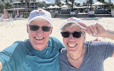Andy and Merrill Silver now — they’re on a beach vacation.