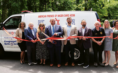 From left: Ariella Rada, spokesperson and Consul for Media Affairs at the Consulate General of Israel in New York, CBI co-chair Dr. Jay More; CBI president Melissa Liebermann; Rabbi Howard Tilman; Cantor Jacob Greenberg; Scotch Plains Mayor Josh Losardo; Dan Sullivan, chief of the Scotch Plains Rescue Squad; Erin D’Auria, district director for Congressman Tom Kean, and Daniella Gefen, community shlicha from the Jewish Federation of Greater MetroWest NJ.