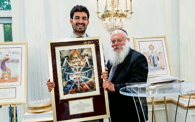 Rabbi Asher Herson, Chabad Center of Northwest NJ’s regional director, presents Jonathan Wickner with the Pillar of Light award. (Photos courtesy Chabad Center of Northwest NJ)